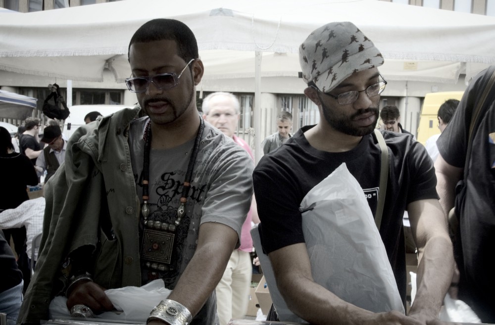 Stones Throw Records' Madlib and J. Rocc digging for records.